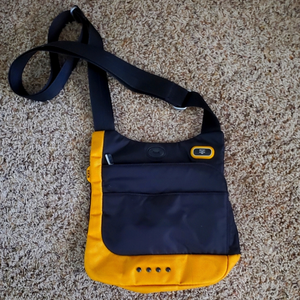 Tumi unisex crossbody